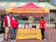 a group of hospital staff standing under a canopy with the USC Arcadia Hospital website on it