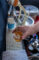 a glass of beer being poured from a keg spout