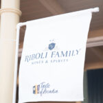 a sign for Riboli Family wines