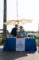 a woman and a man behind a booth set for Always Best Care