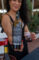 a person holding out a bottle of Berringer wine