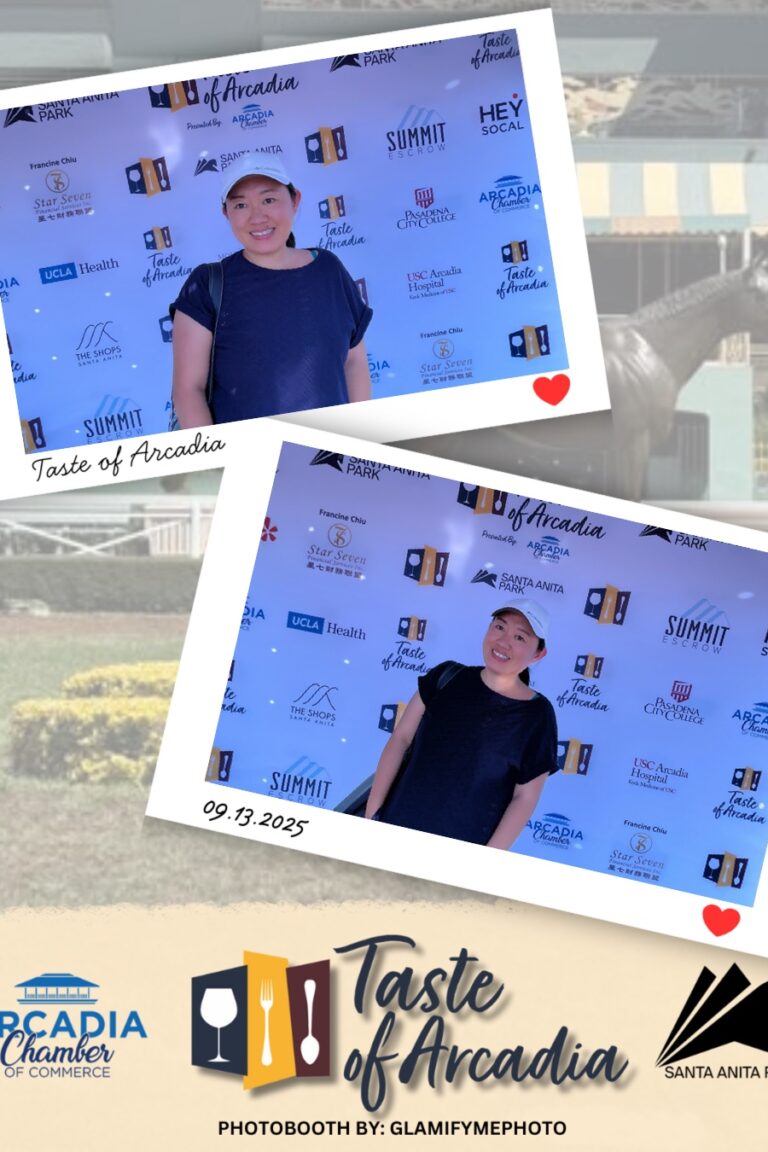 a woman in a blue shirt with white ballcap in a photo booth setting with a background showing the Taste of Arcadia logo