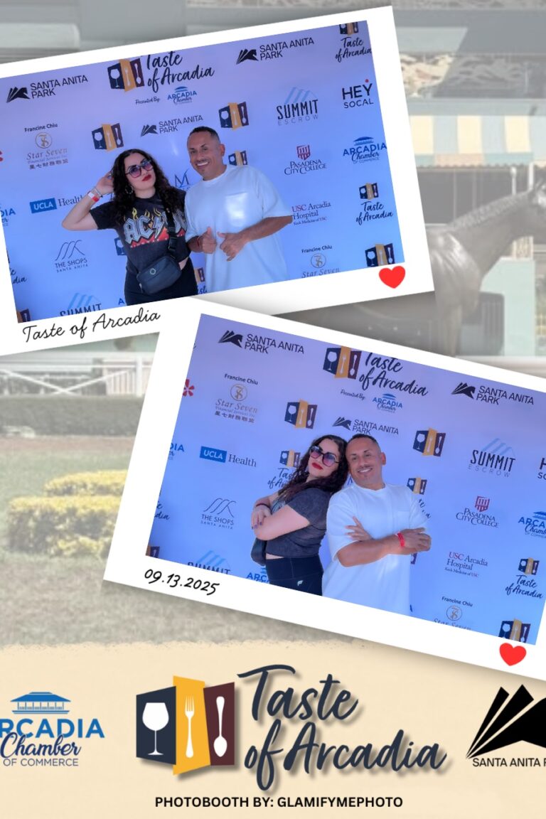 a woman in an AC/DC t-shirt with a man in a white t-shirt in a photo booth setting with a background showing the Taste of Arcadia logo