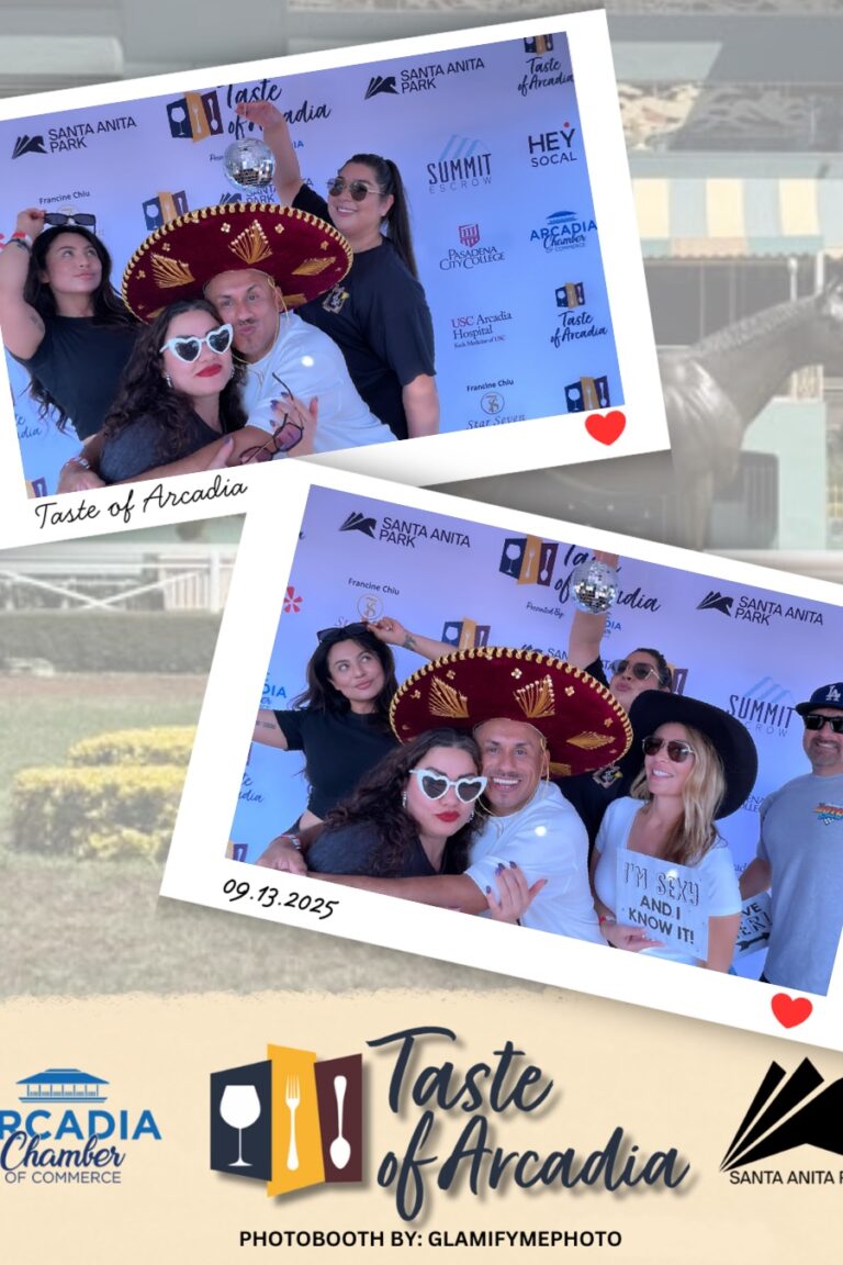 a group of men and women being silly in a photo booth setting with a background showing the Taste of Arcadia logo