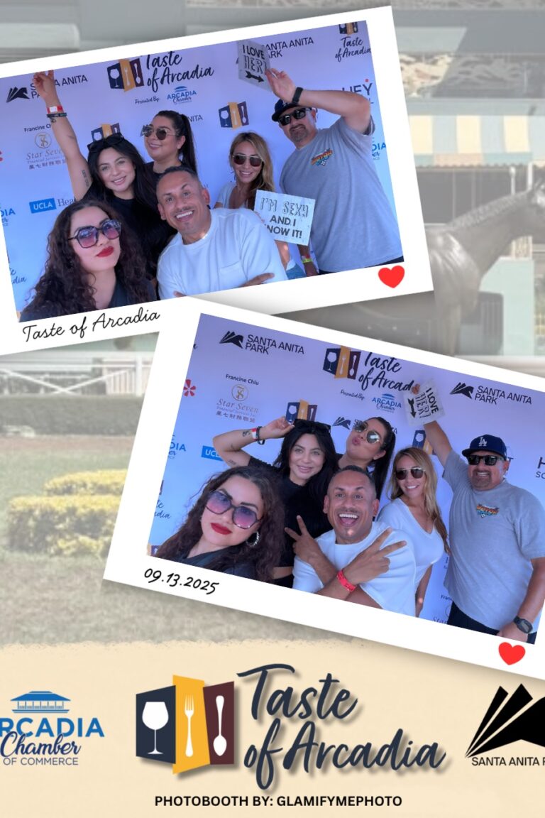 a group of men and women in a in a photo booth setting with a background showing the Taste of Arcadia logo holding funny signs