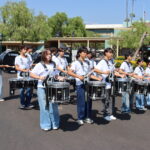 Arcadia High School Marching Drum Line playing in front of Santa Anita Park