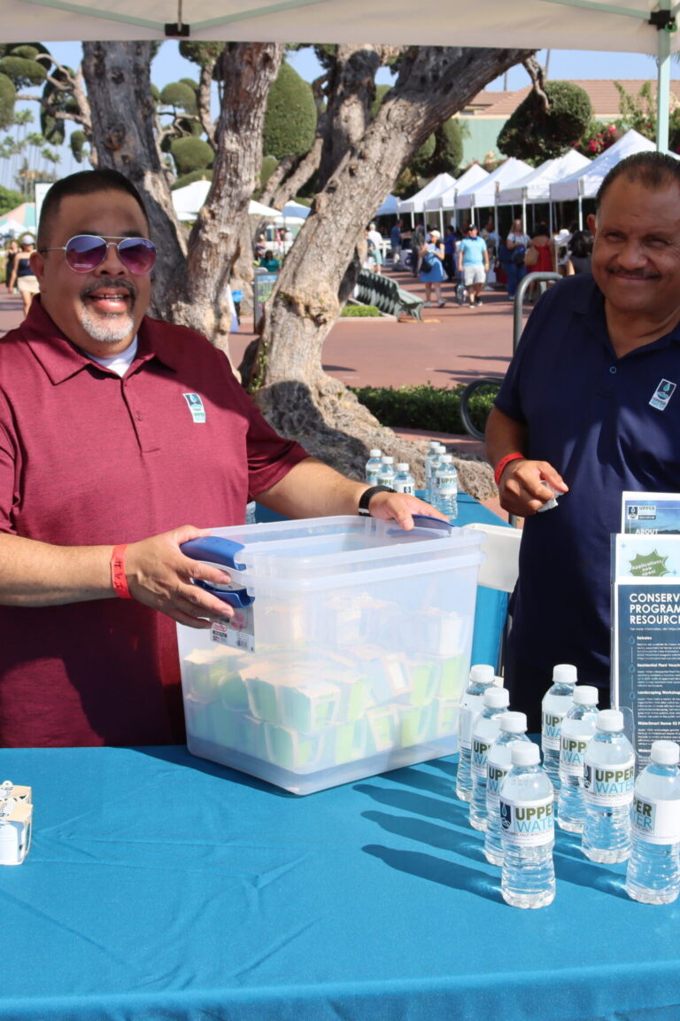 two men from the Upper San Gabriel Water District in their booth