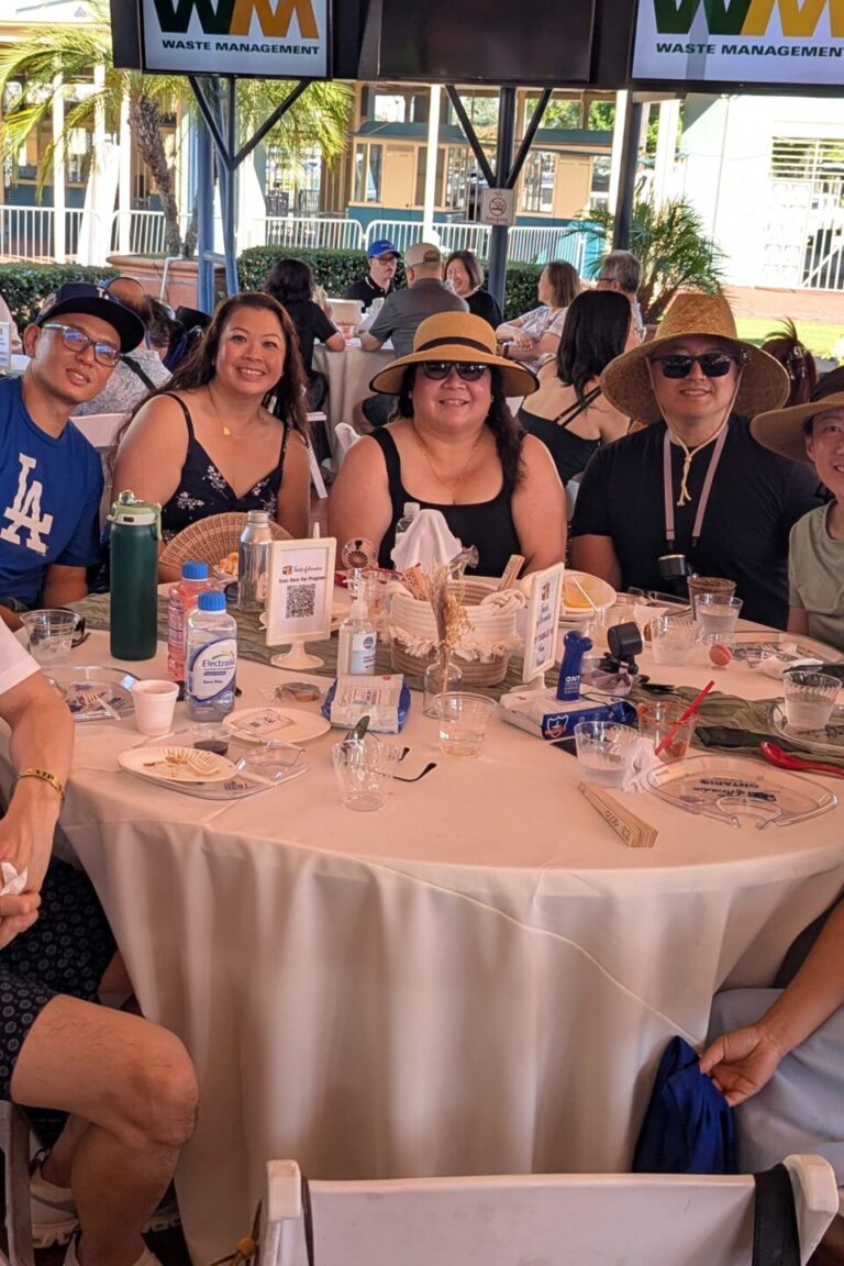 a large group of people at a VIP Table at Taste of Arcadia