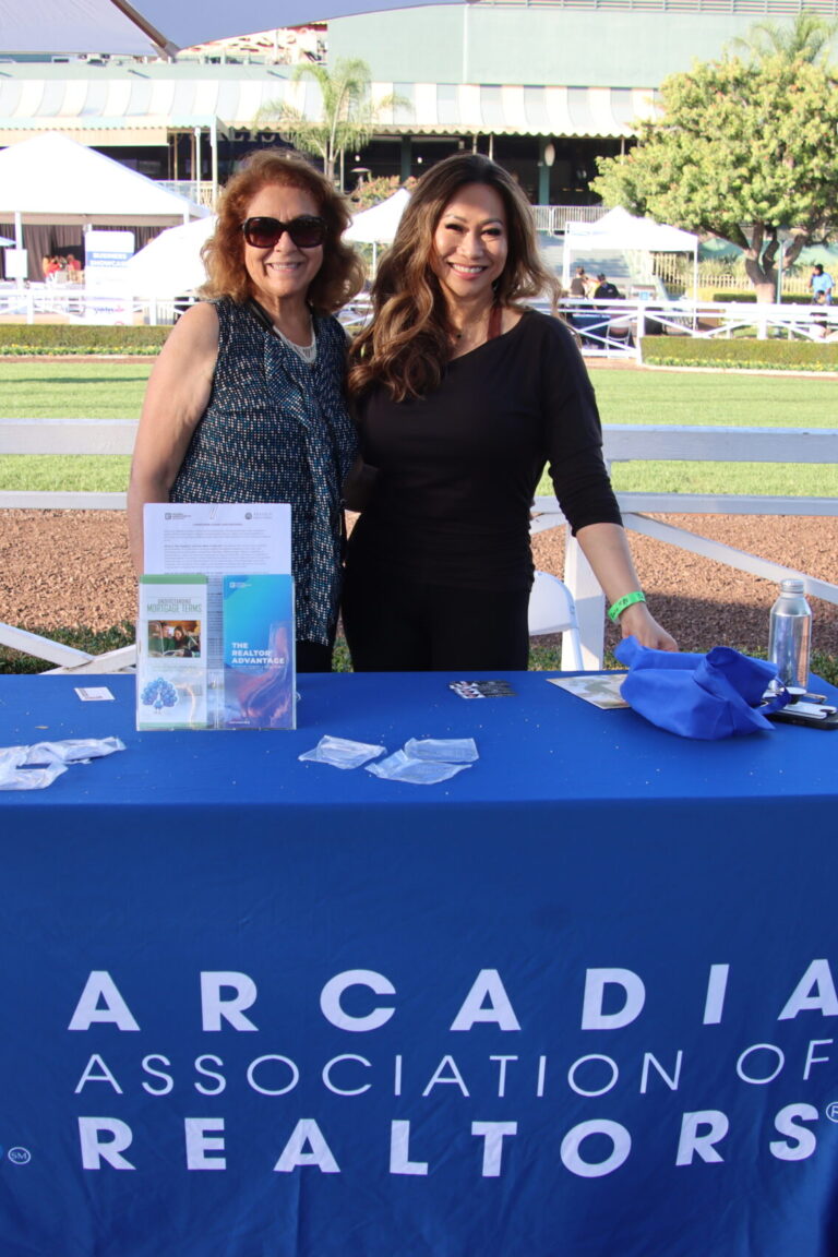 two women at the Arcadia Association of Realtors booth at Taste of Arcadia