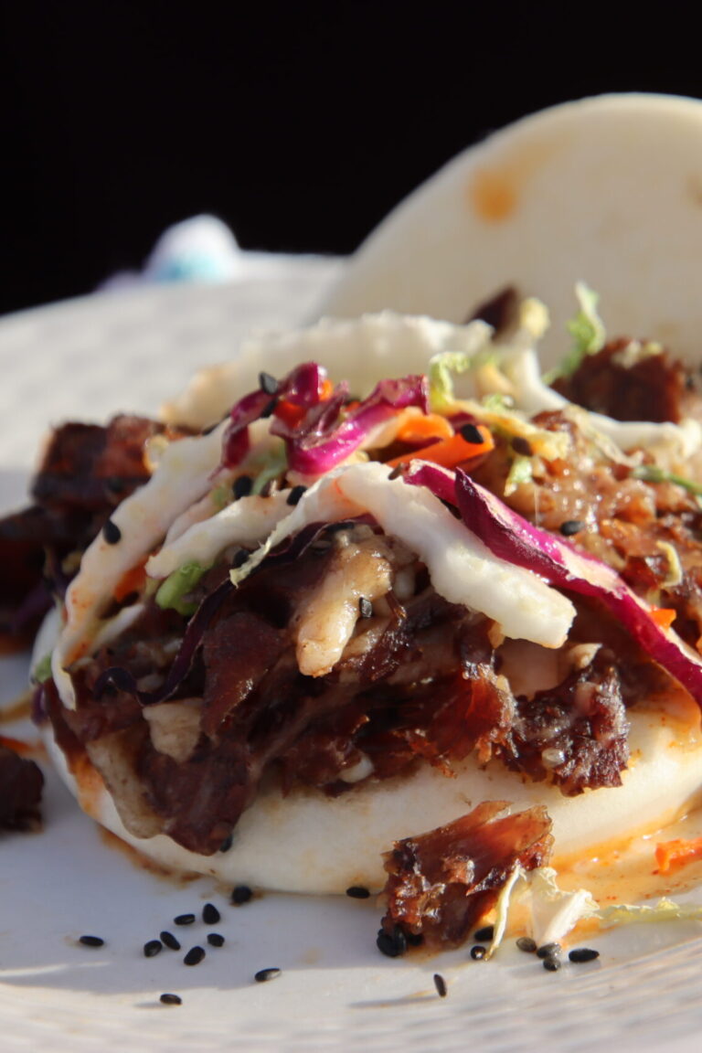 meat and veggies on a bun
